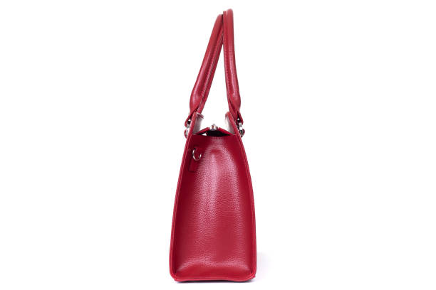 istock red stylish ladies leather bag on a white background, side view 1293798427