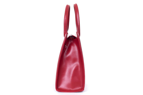 istock red stylish ladies leather bag on a white background, side view 1293798451
