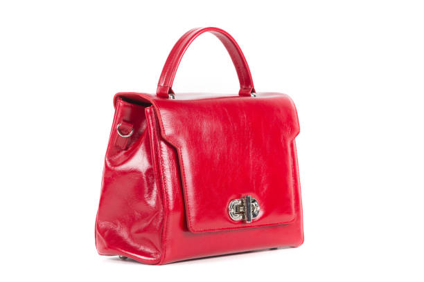 istock red stylish ladies leather bag on a white background 1293798504