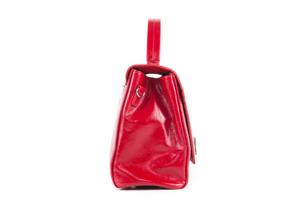 istock red stylish ladies leather bag on a white background, side view 1293798507