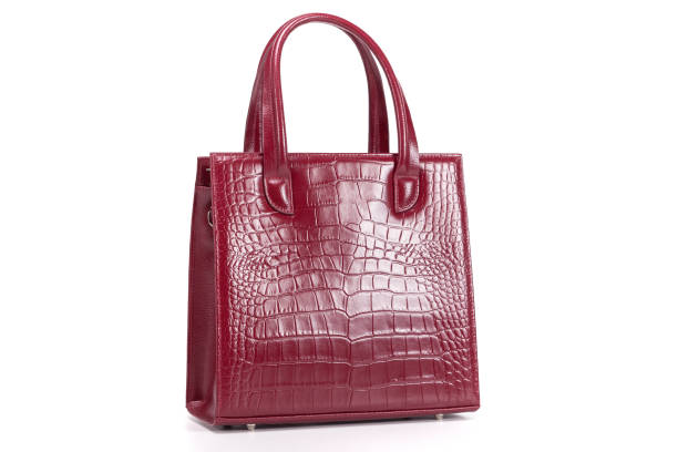 istock red stylish ladies leather bag on a white background 1293798610