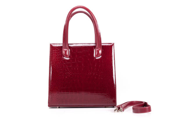 istock red stylish ladies leather bag on a white background 1293798661