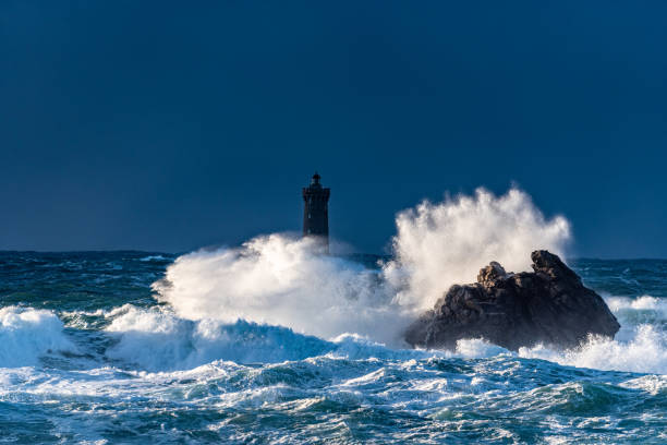 sea and lighthouses of brittany - storm lighthouse cloudscape sea imagens e fotografias de stock