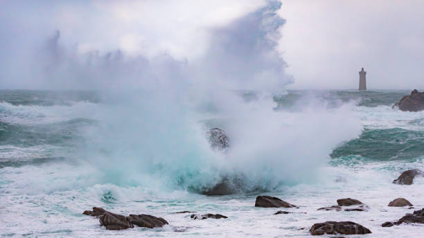 sea and lighthouses of brittany - storm lighthouse cloudscape sea imagens e fotografias de stock