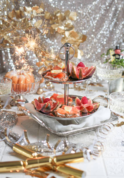istock Festive Party Table with Seafood Appetizer Etagere Tower and Champagne 1293802247