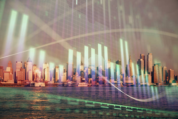 istock Forex chart on cityscape with tall buildings background multi exposure. Financial research concept. 1293807355