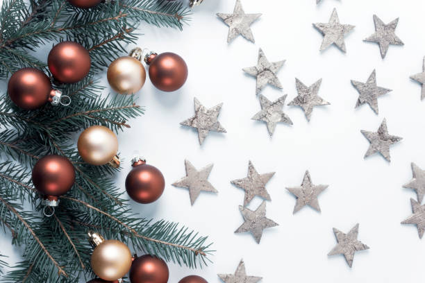 istock Christmas decorations with golden stars on a white background. 1293807382
