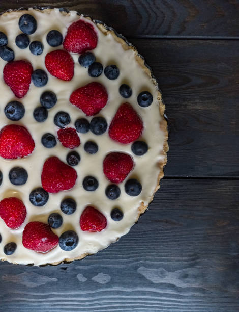 istock Tart with blueberries and strawberries 1293812149