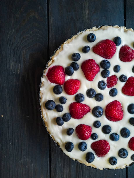 istock Tart with blueberries and strawberries 1293812153