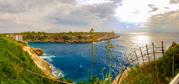 istock Panorama view on bay and Torre den Beu Cala Figuera. 1293812687