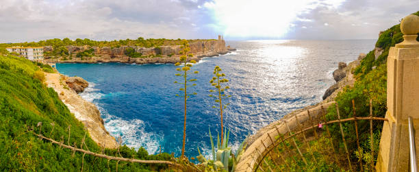 istock Panorama view on bay and Torre den Beu Cala Figuera. 1293812695