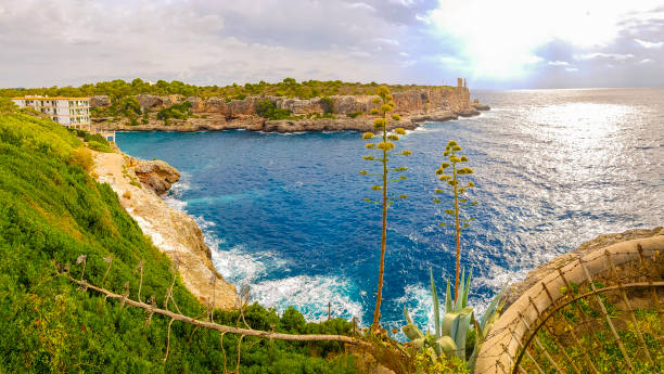 istock Panorama view on bay and Torre den Beu Cala Figuera. 1293812701