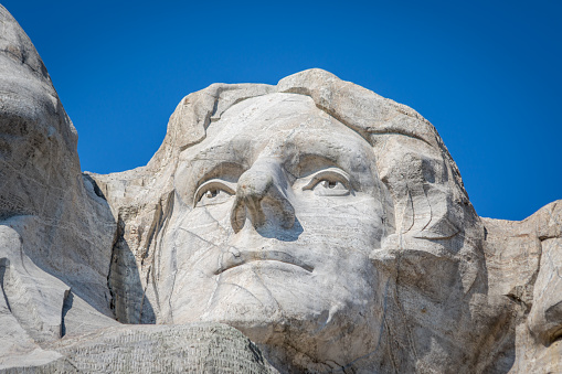 The bust of President Thomas Jefferson carved Borglum into the Black Hills of South Dakota at Mount Rushmore