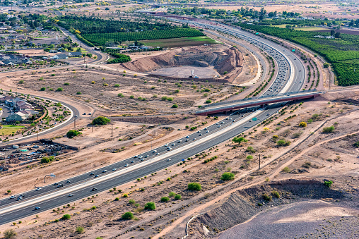 Aerial view of a crowded freeway located just outside of Phoenix, Arizona during rush hour.