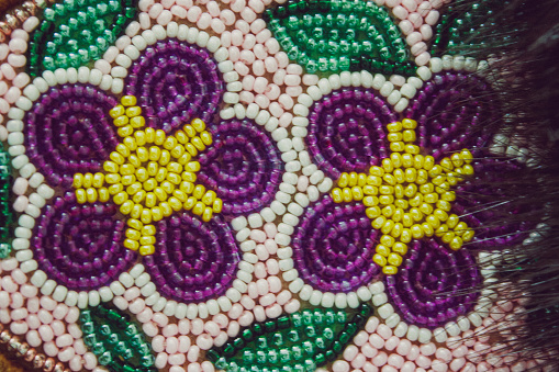 A close-up photo of hand-beaded Indigenous People's of Canada footwear