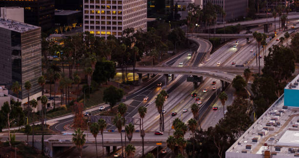 istock Drone Shot of Freeway Passing Financial District in DTLA at Twilight 1293815545