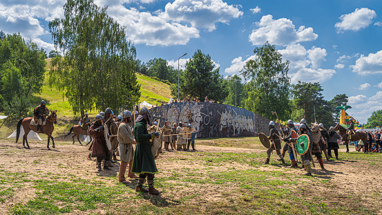 Cedynia, Poland, June 2019 Two military formations with horse riders and warriors preparing for a fight. Historical reenactment of Battle of Cedynia between Poland and Germany, circa 11th century