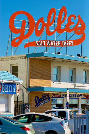 Rehoboth Beach, Delaware, USA - September 17, 2017: The historic “Dolles Salt Water Taffy” sign is a local landmark on the boardwalk in this popular beach town.