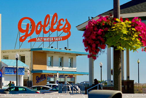 Rehoboth Beach, Delaware, USA - September 17, 2017: The historic “Dolles Salt Water Taffy” sign is a local landmark on the boardwalk in this popular beach town.