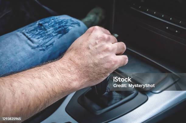 Young Man Driving Modern Bmw Car Hand On Gear Shift Stock Photo - Download Image Now