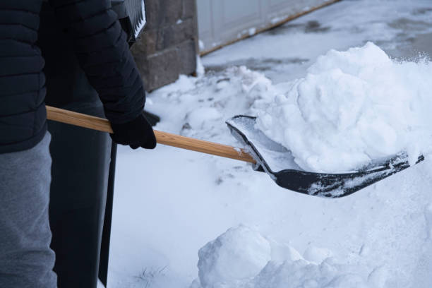 istock Clearing snow from driveway after heavy winter storm 1293846692