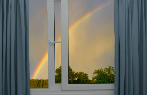 istock view from the window to the sky with a rainbow 1293853125