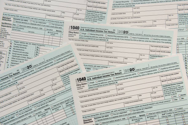 istock US 1040 individual income tax return form. paperwork 1293857330