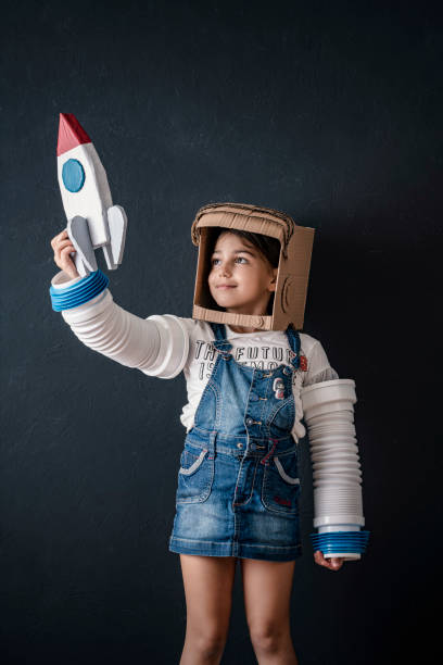 istock Young Business Girl with Rocket Pack 1293861687