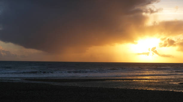 Sunset, Atlantic Ocean, mountains, beaches and beautiful cloudy skies this is the Dingle Peninsula on Ireland’s Wild Atlantic Way, southwest Atlantic coast