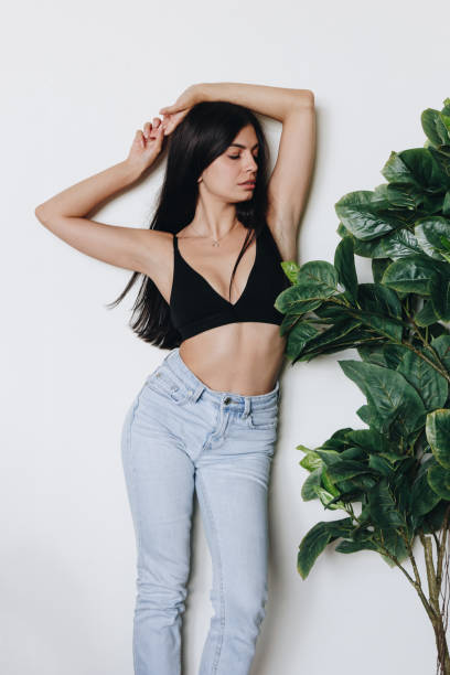 istock Beautiful young woman at home 1293865426