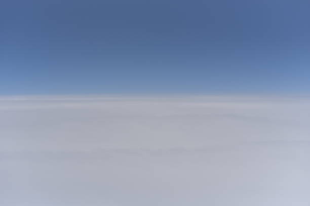 over clouds in troposphere view of sky from airplane which flying over clouds in troposphere earth's atmosphere stock pictures, royalty-free photos & images