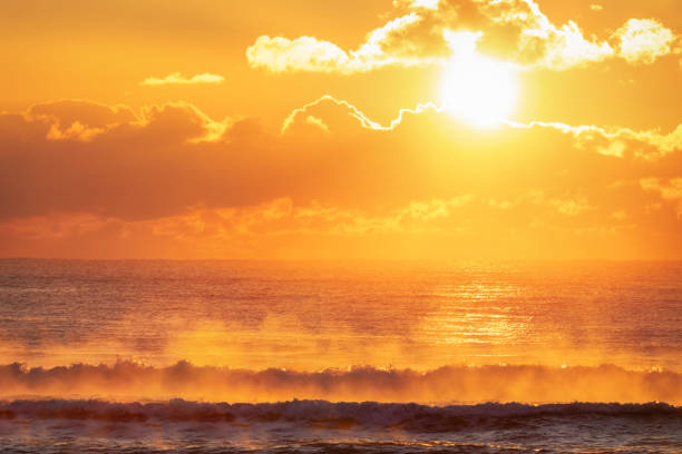 Fiery dawn over the ocean. stock photo