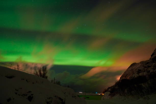 istock Aurora borealis Green northern lights above mountains 1293880978