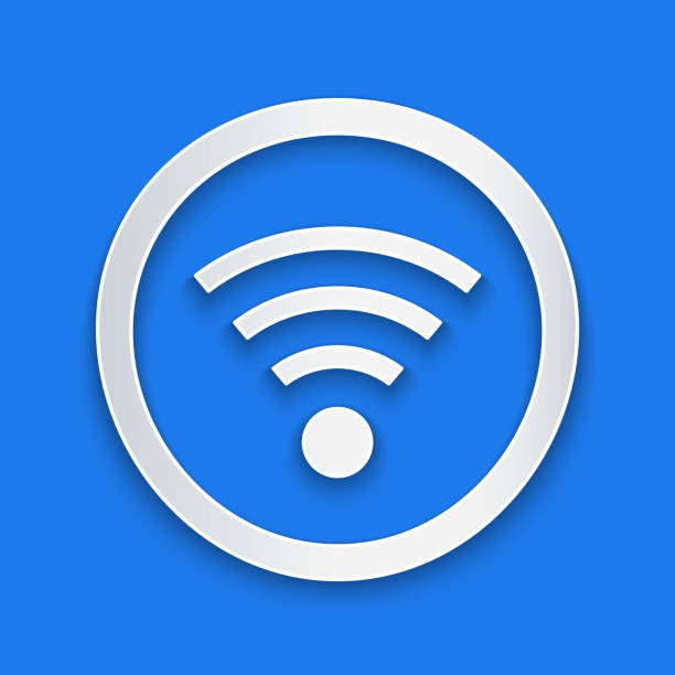 istock Paper cut Wi-Fi wireless internet network symbol icon isolated on blue background. Paper art style. Vector 1293882187