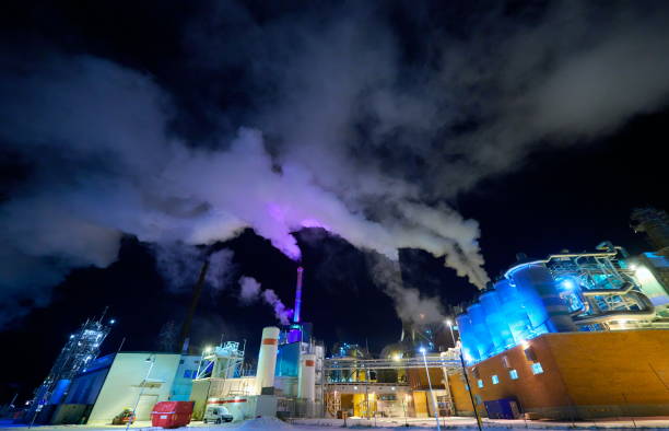 istock Factory at Night Air Pollution From Industrial Smoke 1293883993