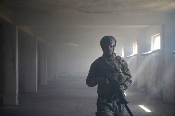 istock modern warfare soldier in urban environment 1293885421