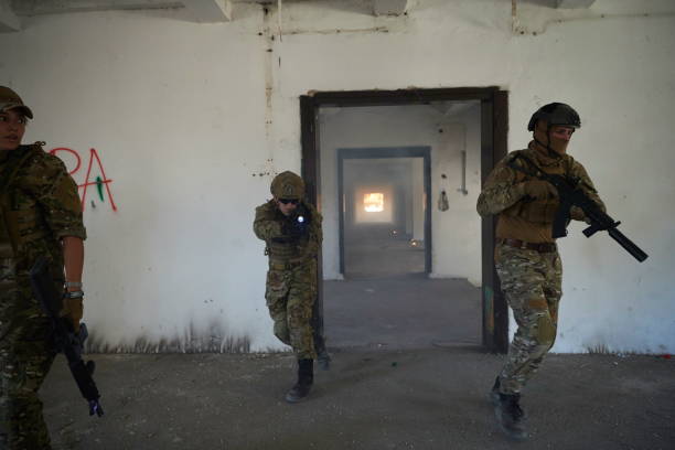 istock military troops in action urban environment 1293886549