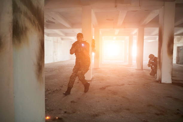 special forces soldiers team in urban environment making tactical assault action