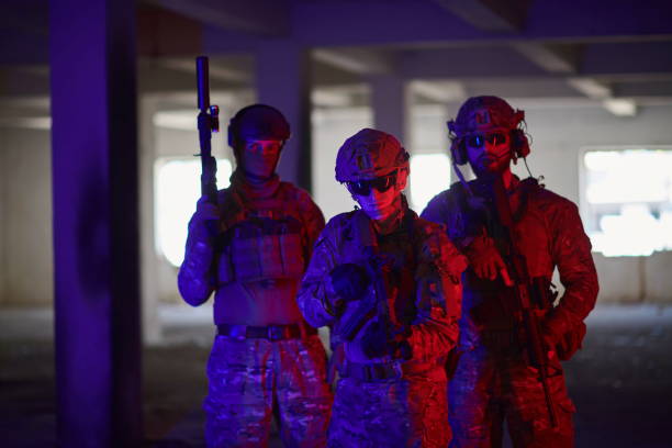istock soldier squad team portrait in urban environment colored lightis 1293891303