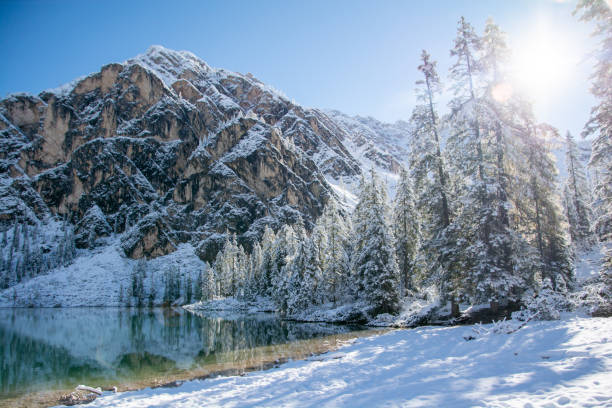 Lake Prags - first snow in a winter wonderland stock photo