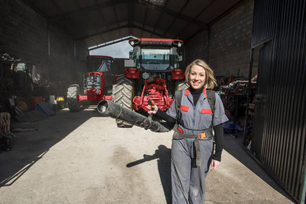 istock Woman with windmill machine works in warehouse. Jaen, Spain 1293892984