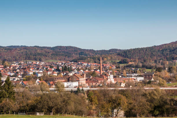istock View from a field with factories and the highway behind 1293893045
