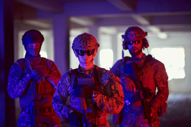 istock soldier squad team portrait in urban environment colored lightis 1293895285