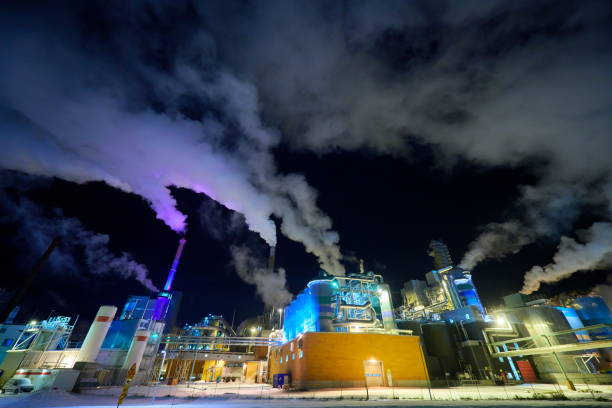 istock Factory at Night Air Pollution From Industrial Smoke 1293895903
