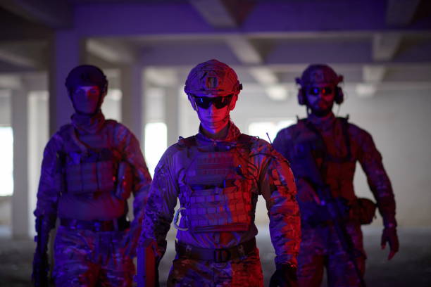 istock soldier squad team portrait in urban environment colored lightis 1293896974
