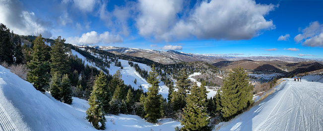 Panoramic view of Wasatch mountains. Winter landscape. Deer Valley resort.