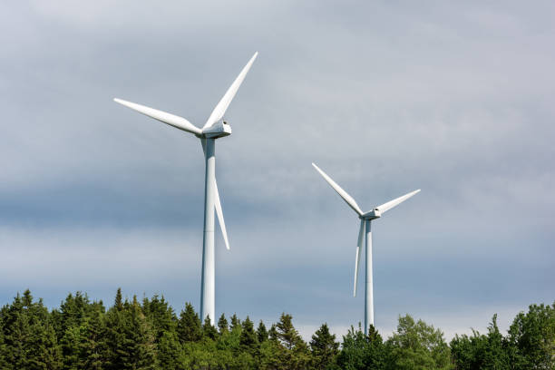 Close-up of two wind turbines