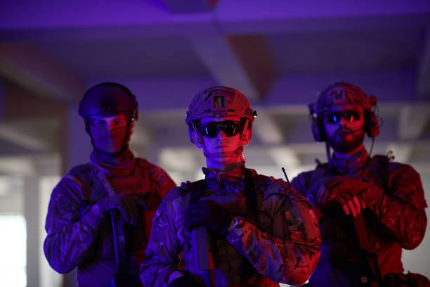istock soldier squad team portrait in urban environment colored lightis 1293898886