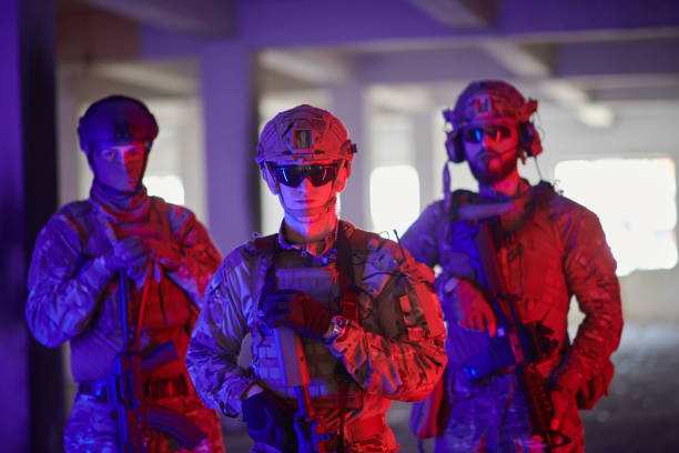 istock soldier squad team portrait in urban environment colored lightis 1293899826