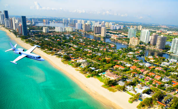 istock Airplane flying to Miami. Aerial View. 1293901260